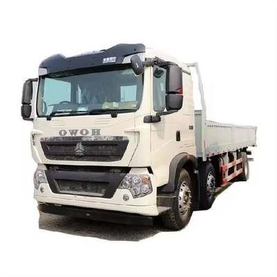 Servicio postventa 3 años 8X4 12 neumáticos 50 toneladas Sinotruk HOWO camión de remate usado para minería