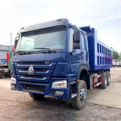 Servicio postventa 3 años 8X4 12 neumáticos 50 toneladas Sinotruk HOWO camión de remate usado para minería
