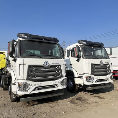 Segmento camión pesado 6X4 60 toneladas Rhd Sinotruk HOWO cabeza de tractor camión manual ventana