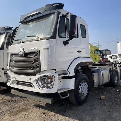 Segmento camión pesado 6X4 60 toneladas Rhd Sinotruk HOWO cabeza de tractor camión manual ventana