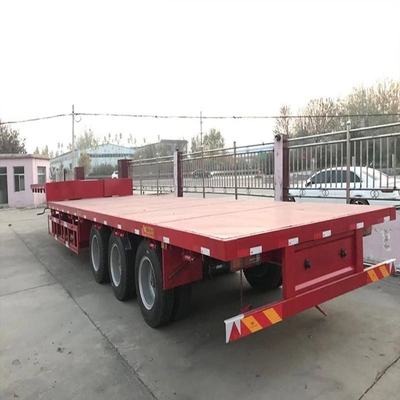 Camión de carga pesada de 3 ejes de cama baja de cama baja de semirremolque de cama plana con elevador hidráulico y cuello de ganso
