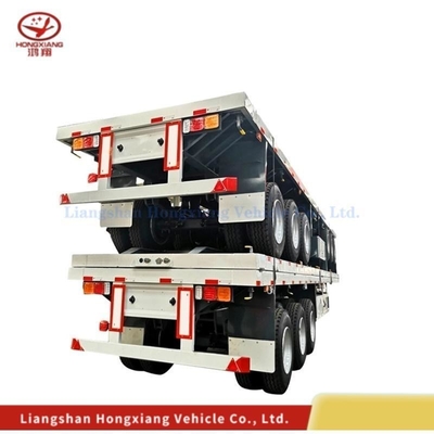 40 FT 3 Ejes Esqueleto de cama plana Semi camión remolque Semi remolque con capacidad de 5,5 toneladas